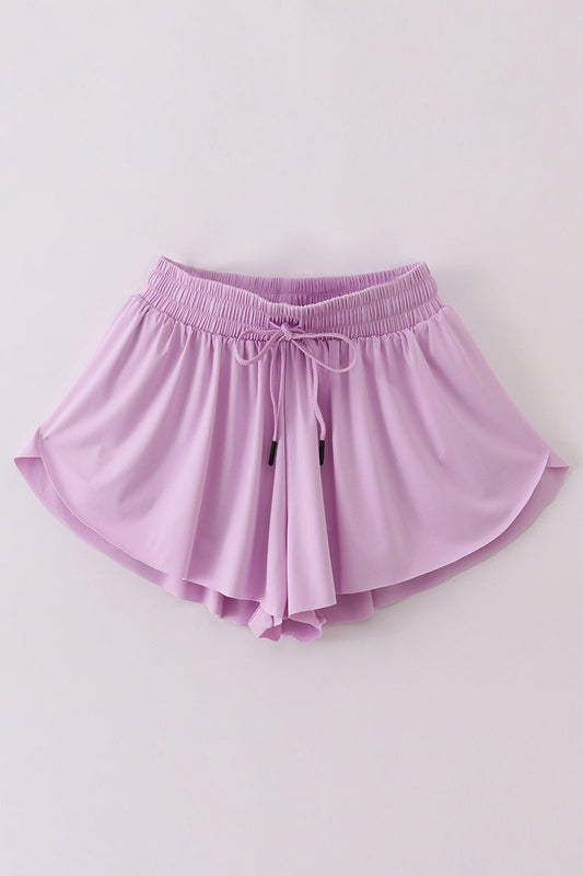 Purple woman sports shorts