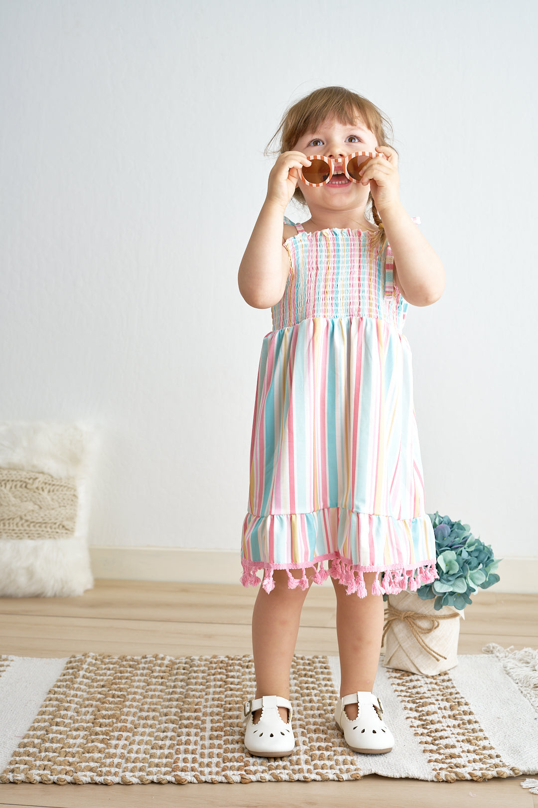 Pink stripe smocked strap dress