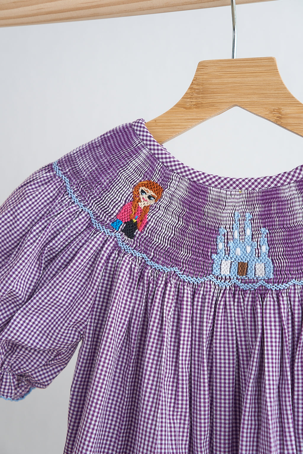 Purple castle hand smocked gingham dress